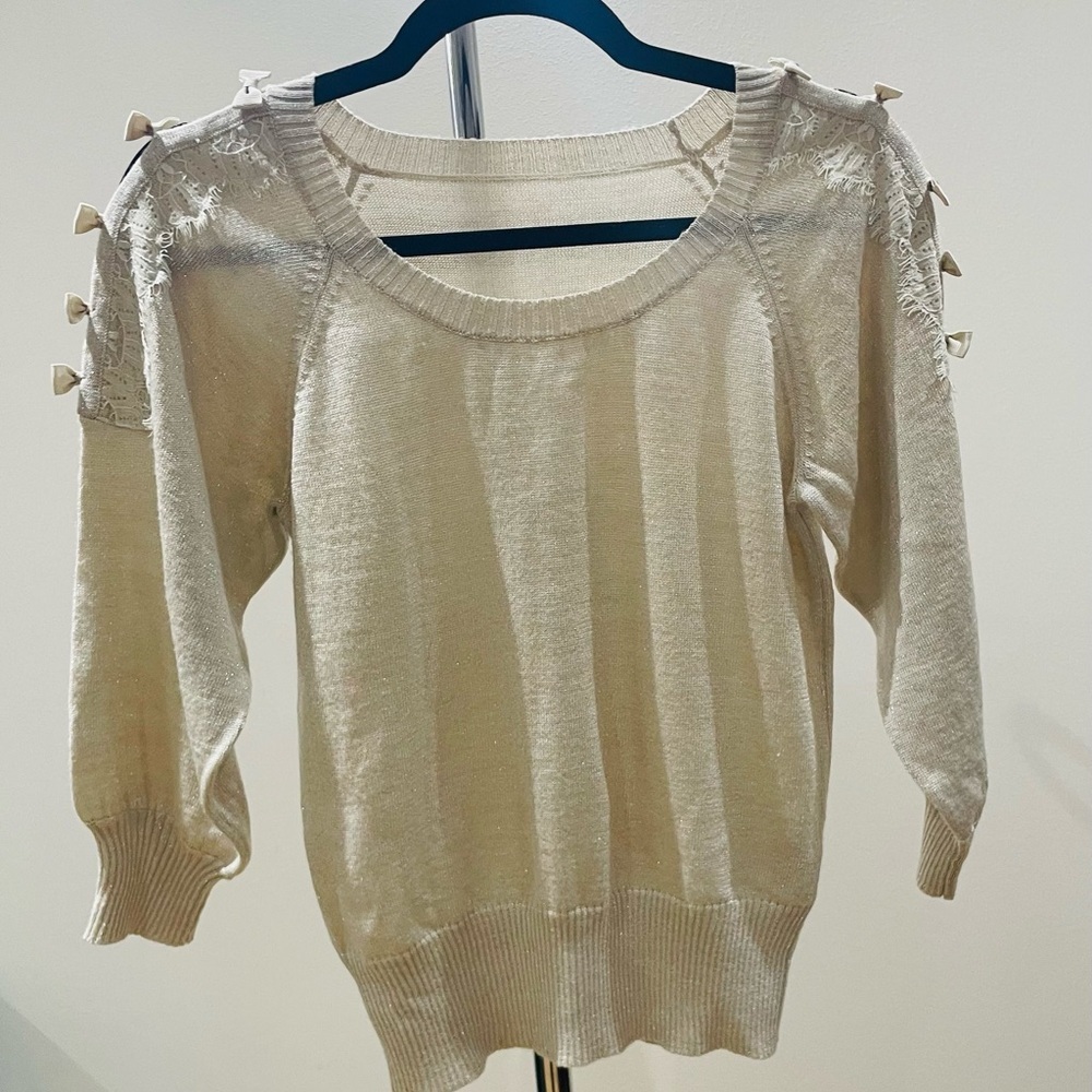 Elegant Cream Sparkle Sweater with Bow Accents
